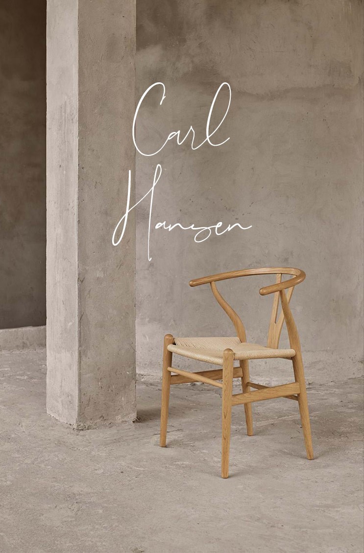 Hier sehen Sie ein Moodbild des Stuhl CH24 von Carl Hansen im RAUM concept store.