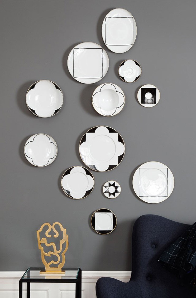 12 schwarz weiße Fürstenberg Teller mit geometrischen Mustern als Wanddekoration