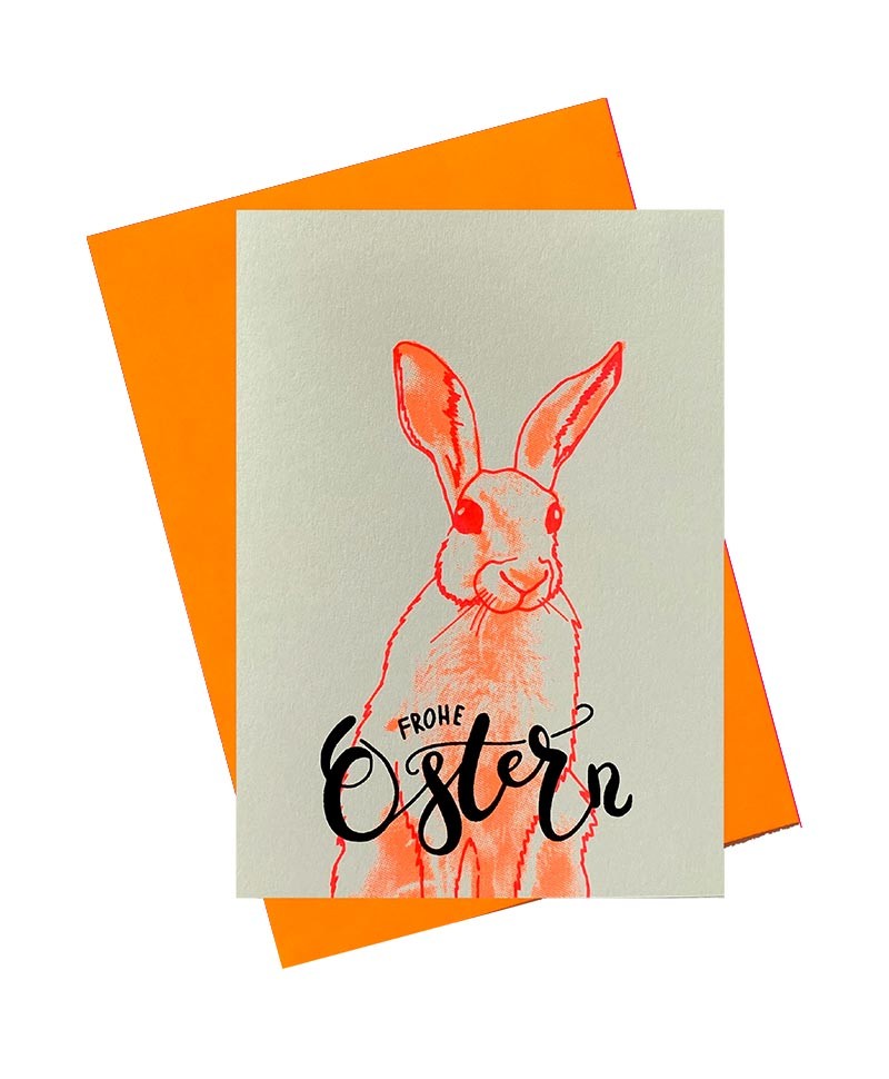 Hier ist ein Bild von: Pink Stories - Handgedruckte Klappkarte "Frohe Ostern" orange im RAUM concept store.