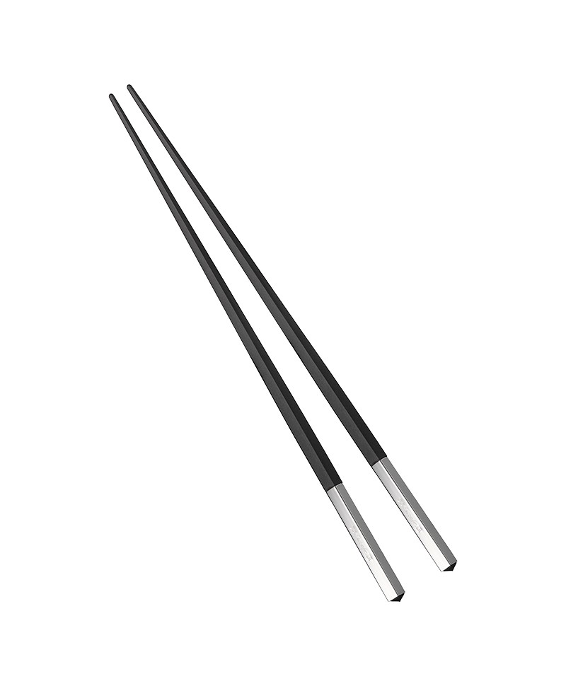 Hier abgebildet sind die Uni Japanese Chopsticks in schwarz von Christofle – im Onlineshop RAUM concept store