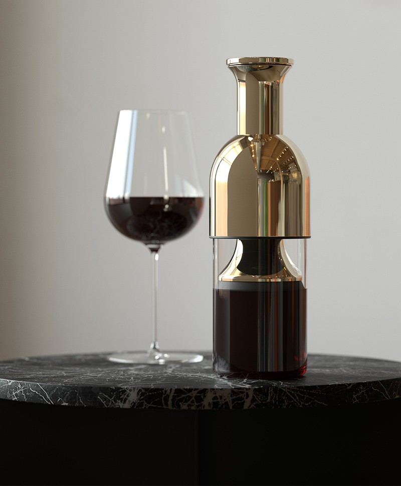 Ein Rotweindekanter von eto neben einem Glas Rotwein