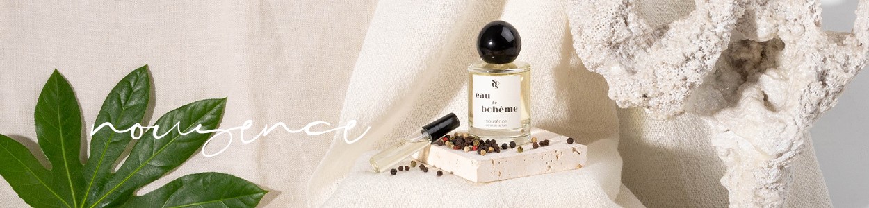 Dieses Moodbild zeigt das Parfum Eau de Boheme von Nousence  mit Früchten im RAUM concept store.