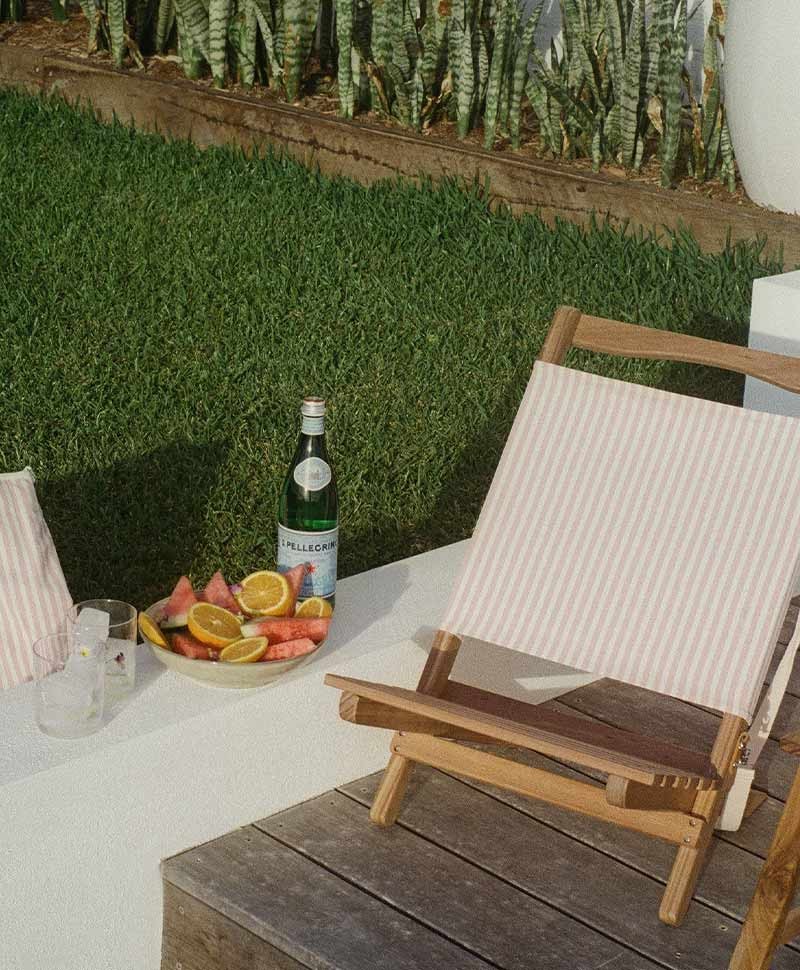 Hier abgebildet ist ein Moodbild der The 2-Piece Chair in lauren´s pink stripe von Business & Pleasure Co. – im RAUM concept store