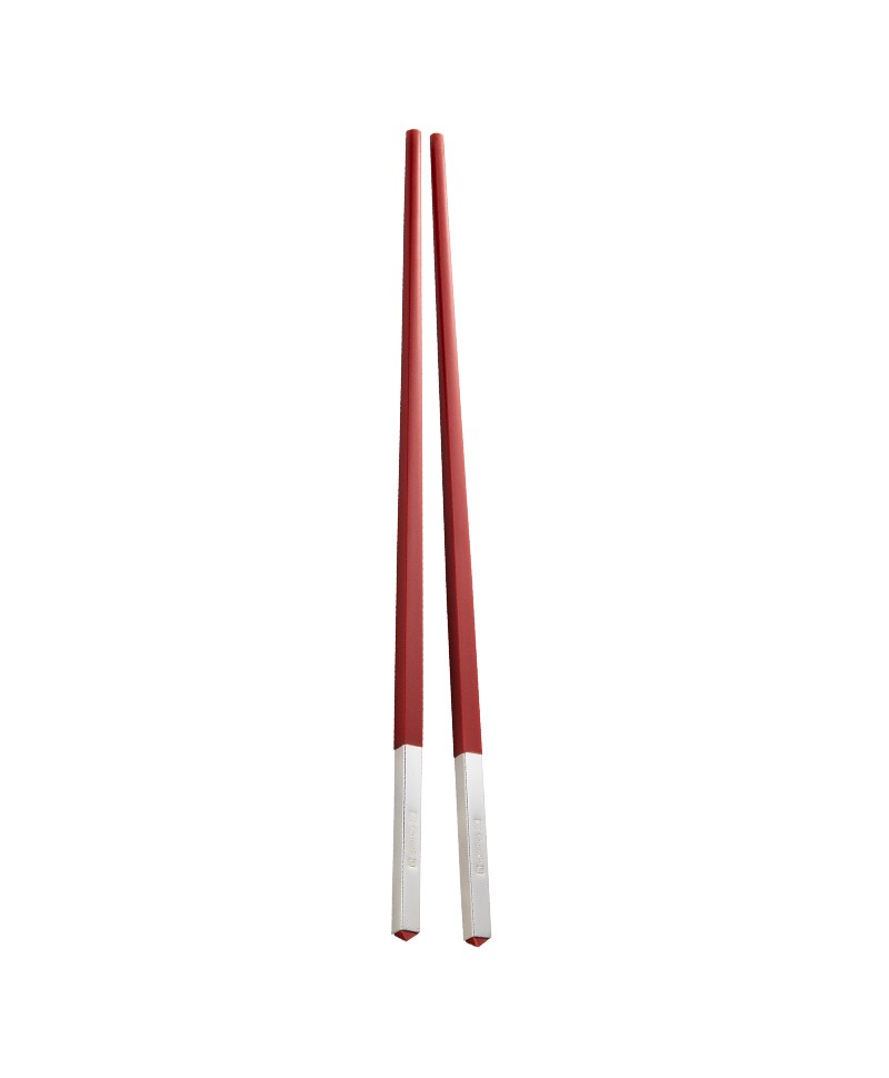 Hier abgebildet sind die Uni Chinese Chopsticks in rot von Christofle – im Onlineshop RAUM concept store
