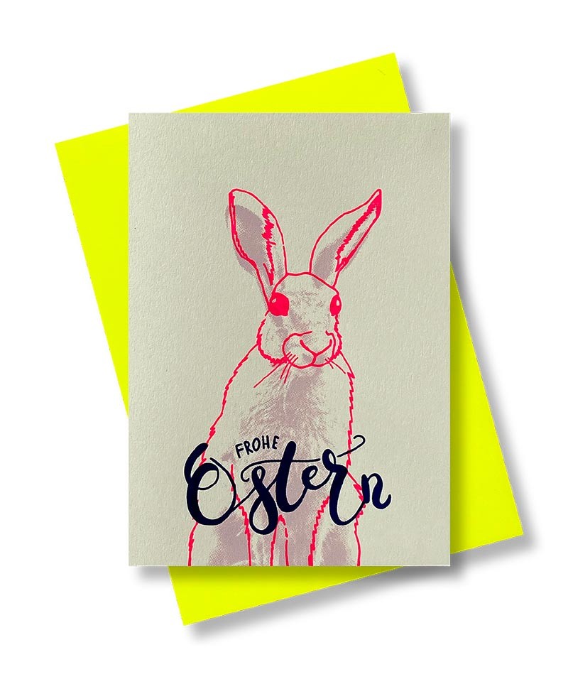 PinkStories Klappkarte "Frohe Ostern" mit neon-pinkem Hasen-Aufdruck und gelben Umschlag
