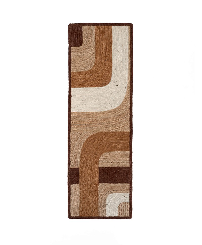 Das Produktbild zeigt den langen Teppich Penny Lane in der Farbe Caramel von Élitis im RAUM concept store