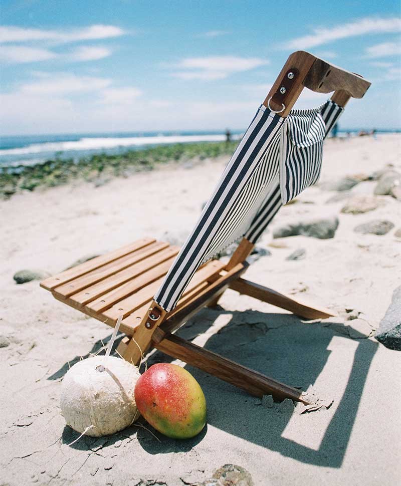 Hier abgebildet ist ein Moodbild der The 2-Piece Chair in lauren´s navy stripe von Business & Pleasure Co. – im RAUM concept store