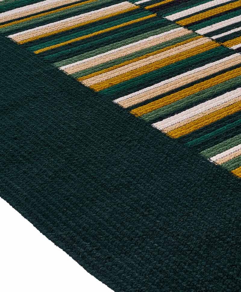 Das Produktbild zeigt eine Nahaufnahme des Outdoor Teppich Abbey Road in der Farbe Cedre von Élitis im RAUM concept store Das Produktbild zeigt eine Nahaufnahme des Outdoor Teppich Abbey Road in der Farbe Cedre von Élitis im RAUM concept store