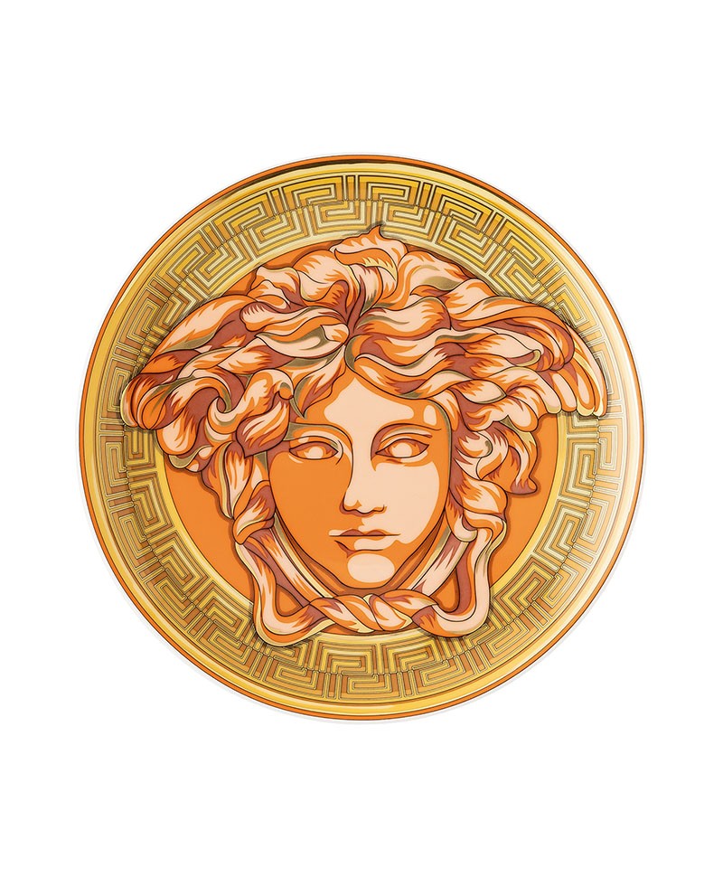 .Hier sehen Sie ein Produktbild von dem Brotteller Medusa Amplified orange coin von Rosenthal x Versace- RAUM concept store