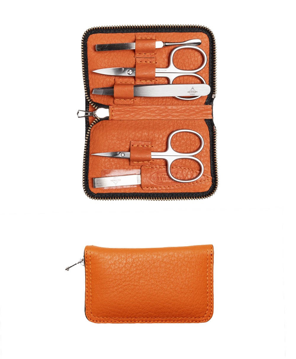Das Produktbild zeigt das Chervo Manicure ZIP S – Maniküre-Etui Chervo Kalbleder in der Farbe orange – im Onlineshop RAUM concept store